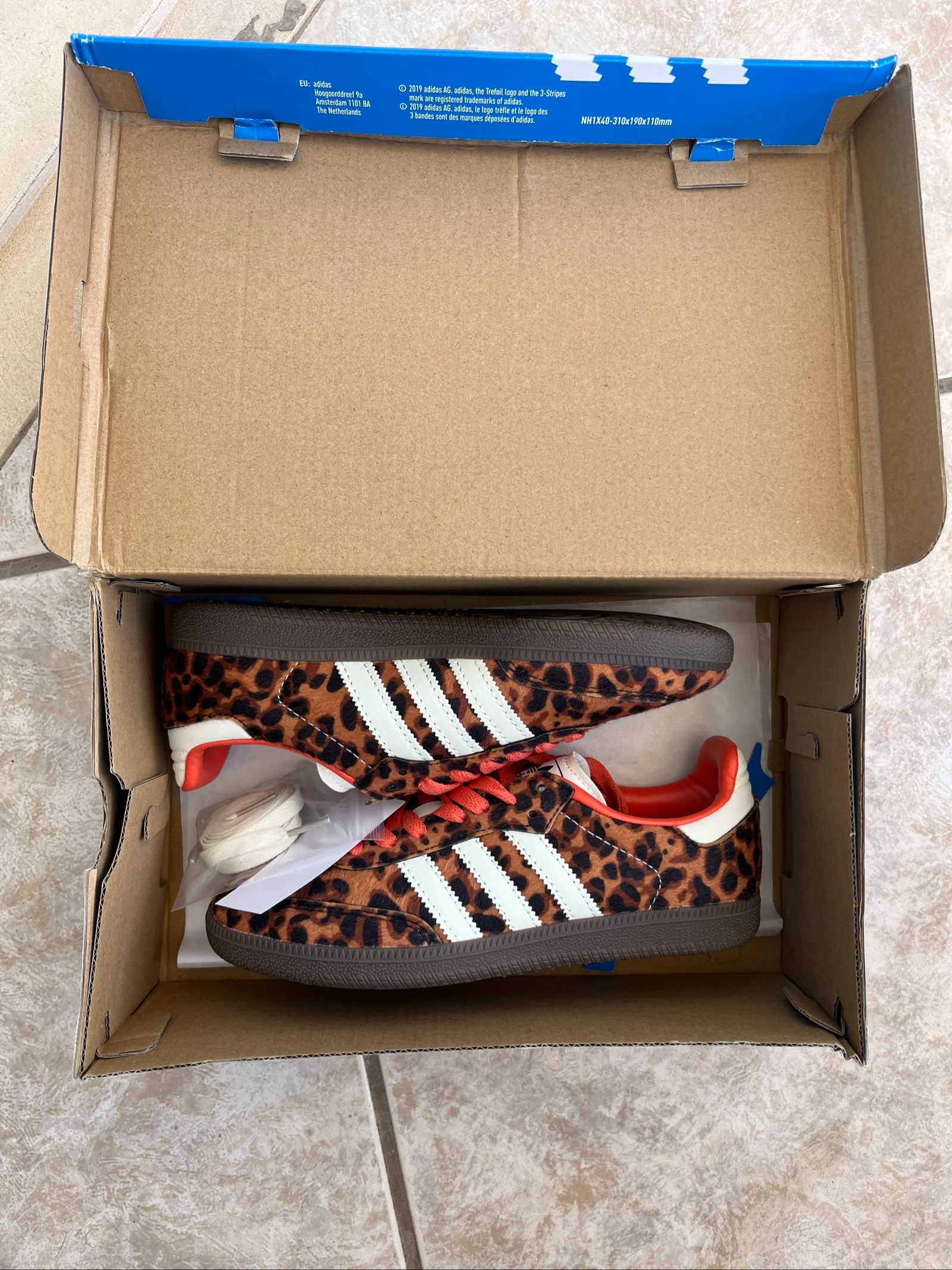 Ténis leopardo feminino 